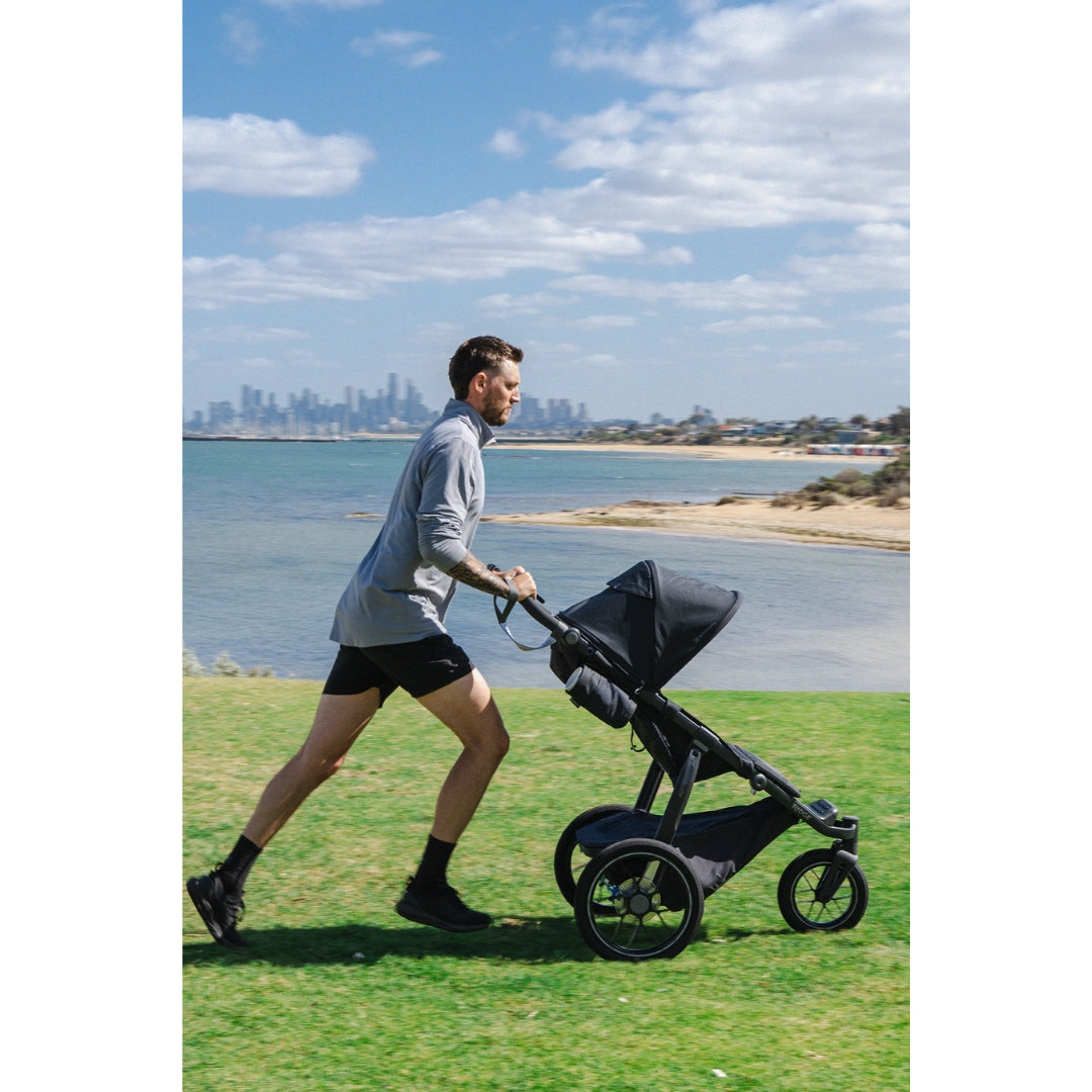 Man pushing stroller