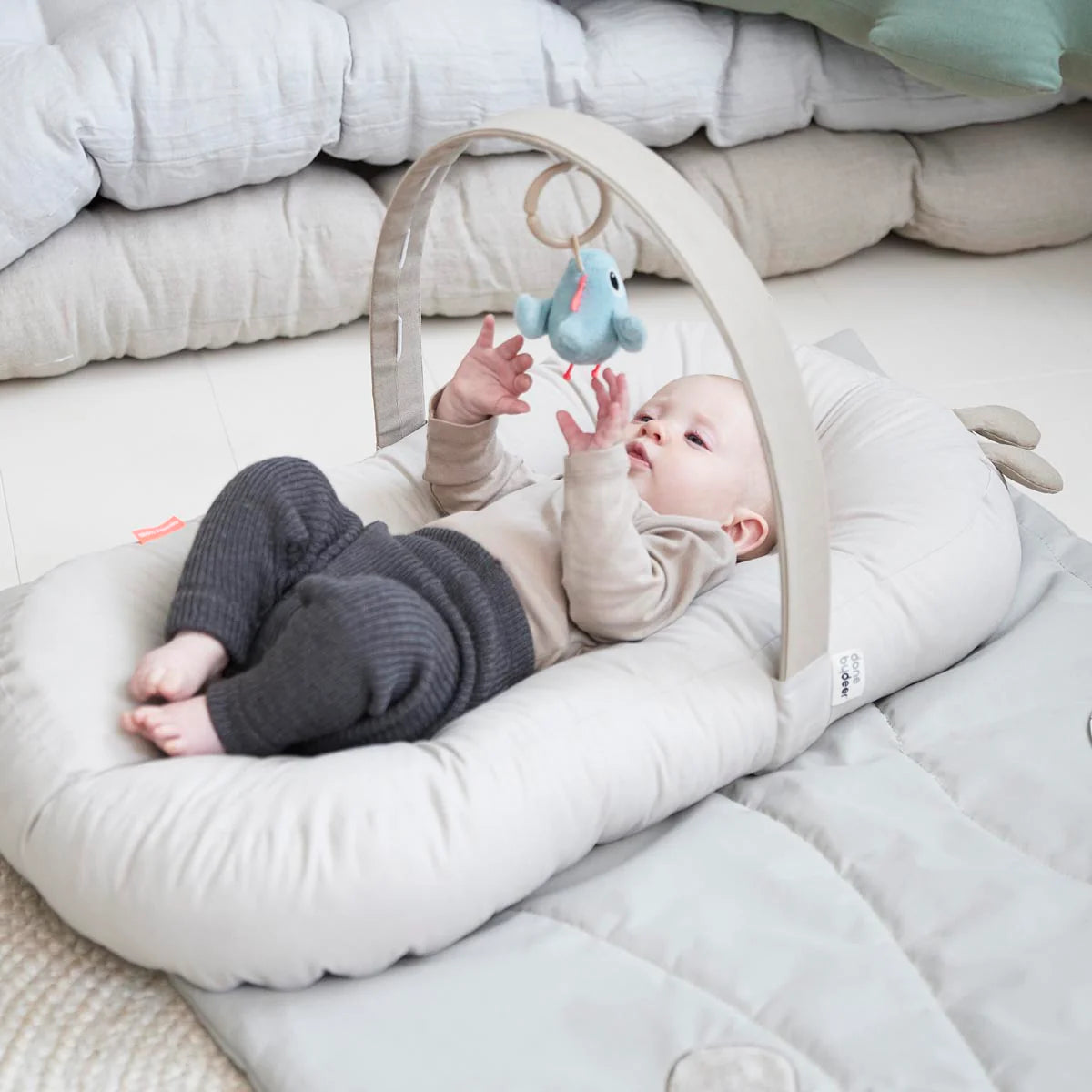 Done By Deer Cozy Lounger with Activity Arch Raffi Sand