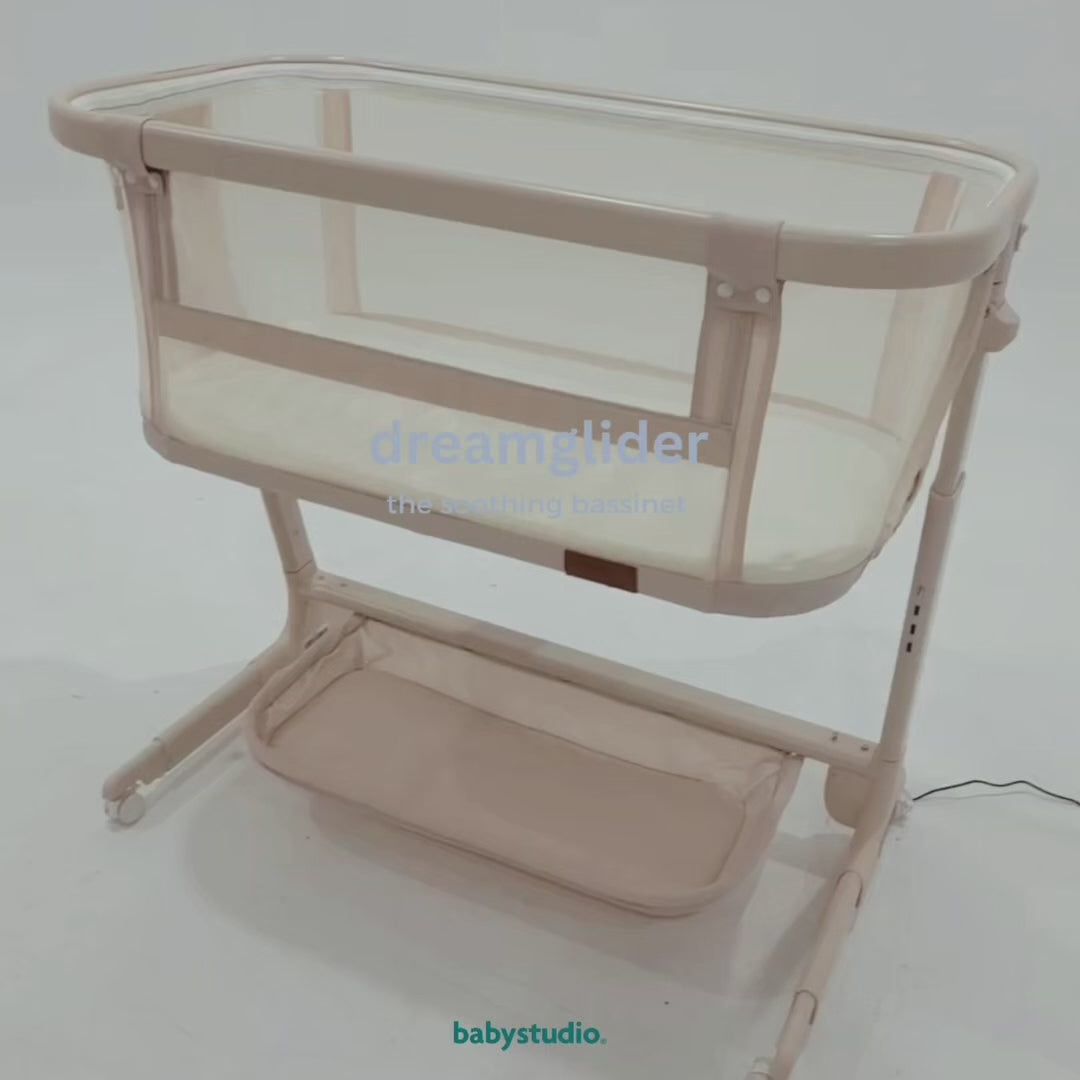 Load video: BabyStudio Dream Glider Bedside Sleeper - Auto Motion Bassinet